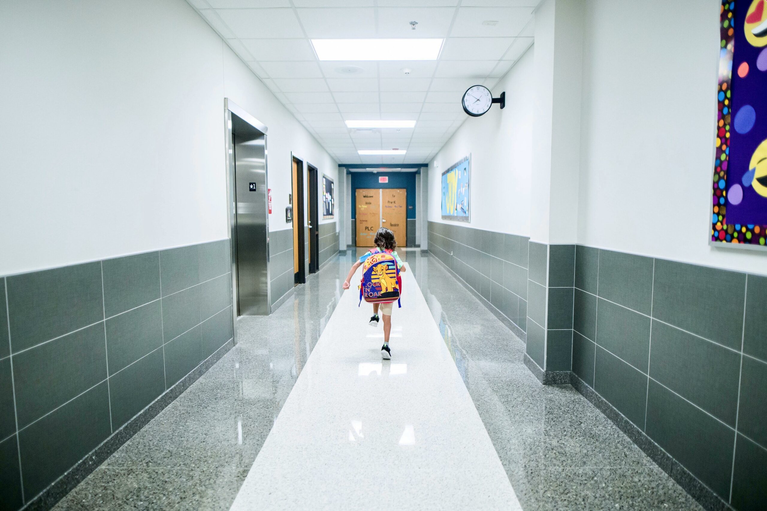 Student walking down a school hallway