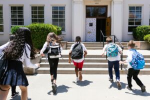 Students running to school